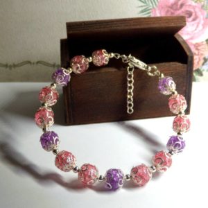 Bracelet ajustable perles verre craquelé rose et mauve